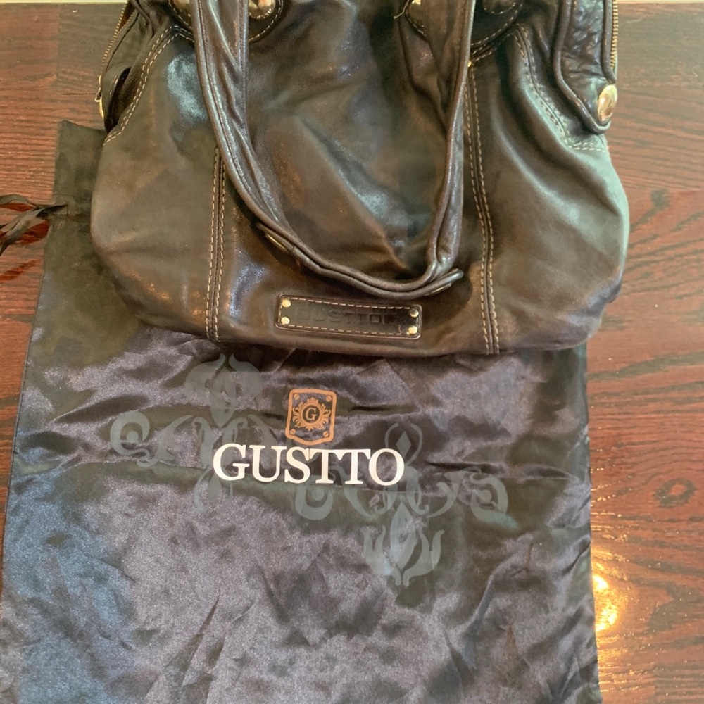 Gustto soft leather brown hand bag